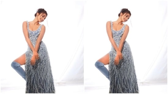 Pooja further accessorised her look for the day in knee-length denim boots and silver hoop earrings.&nbsp;(Instagram/@hegdepooja)