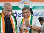 Bengaluru: Former Karnataka CM Jagadish Shettar with Congress President Mallikarjun Kharge during a press conference after joining the Congress Party, at KPCC office in Bengaluru, Monday, April 17, 2023.