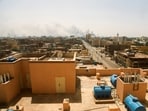Smoke rises over buildings during clashes between the paramilitary Rapid Support Forces and the army in Khartoum, Sudan April 17, 2023. REUTERS/Stringer   NO RESALES. NO ARCHIVES