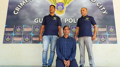Alleged conman Kiran Patel, who obtained government security by posing as a PMO official in Jammu and Kashmir, was brought to the Ahmedabad Crime Branch on Saturday (ANI) Alleged conman Kiran Patel, who obtained government security by posing as a PMO official in Jammu and Kashmir, was brought to the Ahmedabad Crime Branch on Saturday (ANI)