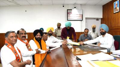 BJP candidate Inder Iqbal Singh Atwal filing his nomination papers for the Jalandhar Lok Sabha byelection on Tuesday. He was accompanied by Punjab BJP chief Ashwani Sharma, Hoshiarpur MP Som Prakash, former minister Manoranjan Kalia, SAD (Sanyukt) leader Parminder Singh Dhindsa. (HT Photo) BJP candidate Inder Iqbal Singh Atwal filing his nomination papers for the Jalandhar Lok Sabha byelection on Tuesday. He was accompanied by Punjab BJP chief Ashwani Sharma, Hoshiarpur MP Som Prakash, former minister Manoranjan Kalia, SAD (Sanyukt) leader Parminder Singh Dhindsa. (HT Photo)