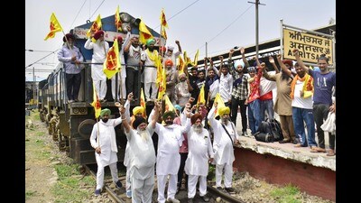 Farmers block a railway track in Amritsar on Tuesday. (Sameer Sehgal /HT) Farmers block a railway track in Amritsar on Tuesday. (Sameer Sehgal /HT)