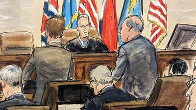 This artist sketch depicts Dominion Voting Systems attorney Justin Nelson, standing left, and Fox News attorney Daniel Webb, standing at right, speaking to Judge Eric Davis before finishing jury selection in Delaware Superior Court Tuesday, April 18, 2023, in Wilmington. (Elizabeth Williams via AP) This artist sketch depicts Dominion Voting Systems attorney Justin Nelson, standing left, and Fox News attorney Daniel Webb, standing at right, speaking to Judge Eric Davis before finishing jury selection in Delaware Superior Court Tuesday, April 18, 2023, in Wilmington. (Elizabeth Williams via AP)