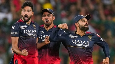 Royal Challengers Bangalore bowler Mohammed Siraj and teammate Virat Kohli celebrate (PTI) Royal Challengers Bangalore bowler Mohammed Siraj and teammate Virat Kohli celebrate (PTI)