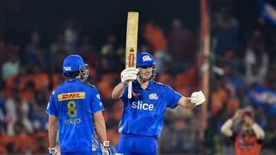 Hyderabad: Mumbai Indians batter Cameron Green celebrates his half century during the IPL 2023 cricket match between Sunrisers Hyderabad and Mumbai Indians, at Rajiv Gandhi International Cricket Stadium, in Hyderabad, Tuesday, April 18, 2023. (PTI Photo)(PTI04_18_2023_000272A) (PTI) Hyderabad: Mumbai Indians batter Cameron Green celebrates his half century during the IPL 2023 cricket match between Sunrisers Hyderabad and Mumbai Indians, at Rajiv Gandhi International Cricket Stadium, in Hyderabad, Tuesday, April 18, 2023. (PTI Photo)(PTI04_18_2023_000272A) (PTI)
