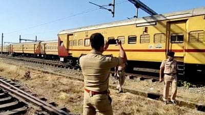 Police personnel during an investigation into the train fire incident in Kozhikode. (ANI File) Police personnel during an investigation into the train fire incident in Kozhikode. (ANI File)