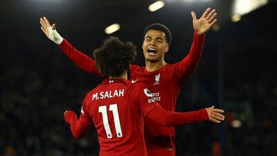 Liverpool's Mohamed Salah celebrates scoring their fourth goal with Cody Gakpo (REUTERS)