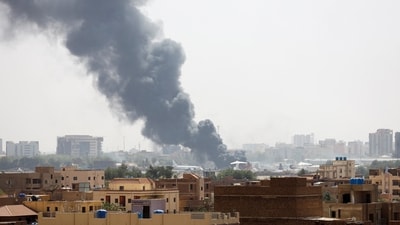 Smoke rises from burning aircraft inside Khartoum Airport during clashes between the paramilitary Rapid Support Forces and the army in Khartoum, Sudan April 17, 2023 (REUTERS)