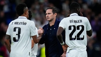 Chelsea's head coach Frank Lampard, center, congratulates Real Madrid's Eder Militao reacts after the Champions League quarterfinal, first leg, soccer match between Real Madrid and Chelsea at the Santiago Bernabeu stadium in Madrid, Spain, Wednesday, April 12, 2023. Real won 2-0. (AP Photo/Manu Fernandez) (AP) Chelsea's head coach Frank Lampard, center, congratulates Real Madrid's Eder Militao reacts after the Champions League quarterfinal, first leg, soccer match between Real Madrid and Chelsea at the Santiago Bernabeu stadium in Madrid, Spain, Wednesday, April 12, 2023. Real won 2-0. (AP Photo/Manu Fernandez) (AP)