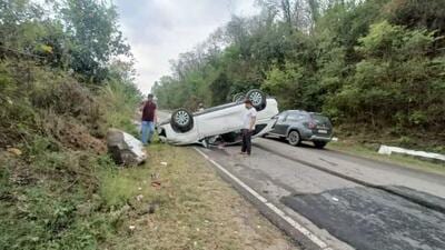 The car in which BJP MLA Satpal Singh Satti was travelling when it overturned near Lathiani, 40km from the district headquarters of Una, on Tuesday morning. (HT Photo)