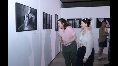 Visitors taking a look at the works on display (HT Photos)