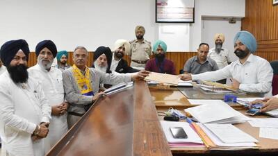 he Shiromani Akali Dal and Bahujan Samaj Party (SAD-BSP) candidate, Dr Sukhwinder Kumar Sukhi, 62, filing his nomination papers for the Jalandhar Lok Sabha by-election on Tuesday. Senior Akali leader Dr Daljit Singh Cheema and BSP state president Jasbir Singh Garhi were present. (HT Photo) he Shiromani Akali Dal and Bahujan Samaj Party (SAD-BSP) candidate, Dr Sukhwinder Kumar Sukhi, 62, filing his nomination papers for the Jalandhar Lok Sabha by-election on Tuesday. Senior Akali leader Dr Daljit Singh Cheema and BSP state president Jasbir Singh Garhi were present. (HT Photo)