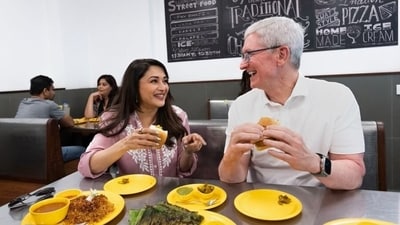 Before the Apple store launch, Madhuri Dixit welcomed Tim Cook by taking him out to gorge on some vada pav. Sharing the picture, she wrote on Instagram, “Can’t think of a better welcome to Mumbai than Vada Pav!” Before the Apple store launch, Madhuri Dixit welcomed Tim Cook by taking him out to gorge on some vada pav. Sharing the picture, she wrote on Instagram, “Can’t think of a better welcome to Mumbai than Vada Pav!”