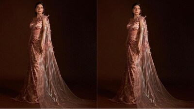 Kajol posed as the perfect muse for fashion designer Amit Aggarwal, donning a breathtaking rose gold sequinned and hand-embroidered saree-gown. (Instagram/@kajol) Kajol posed as the perfect muse for fashion designer Amit Aggarwal, donning a breathtaking rose gold sequinned and hand-embroidered saree-gown. (Instagram/@kajol)