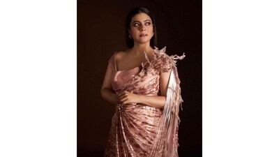 Kajol added some stunning accessories to complete her look, including statement oversized studs and rings on her hands. Styled by fashion stylist Radhika Mehra, she kept her straight hair open as she confidently posed for the cameras. (Instagram/@kajol) Kajol added some stunning accessories to complete her look, including statement oversized studs and rings on her hands. Styled by fashion stylist Radhika Mehra, she kept her straight hair open as she confidently posed for the cameras. (Instagram/@kajol)
