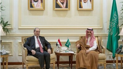 Saudi Foreign Minister Prince Faisal bin Farhan bin Abdullah with Syrian Minister of Foreign Affairs and Expatriates Faisal Mekdad in Jeddah. (Reuters) Saudi Foreign Minister Prince Faisal bin Farhan bin Abdullah with Syrian Minister of Foreign Affairs and Expatriates Faisal Mekdad in Jeddah. (Reuters)