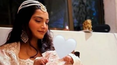Sonam Kapoor and her son Vayu from their Diwali 2022 party.