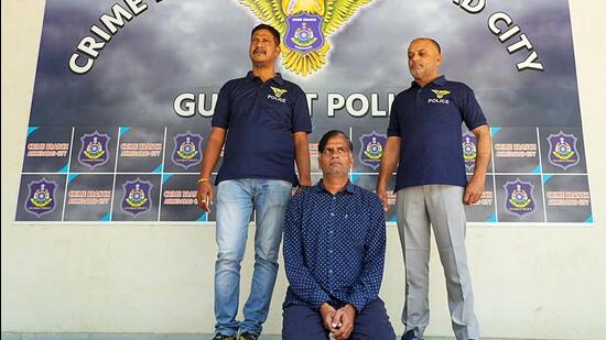 Alleged conman Kiran Patel, who obtained government security by posing as a PMO official in Jammu and Kashmir, was brought to the Ahmedabad Crime Branch on Saturday (ANI)