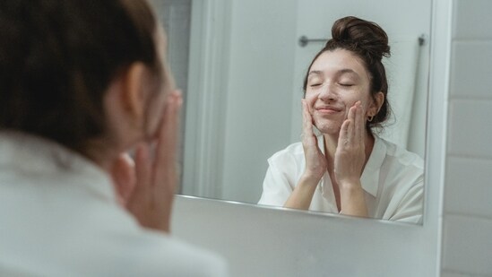 Cleanse your face twice a day: Cleansing your face is essential to remove excess oil and dirt that clog pores and lead to breakouts. Use a gentle, oil-free cleanser to wash your face twice a day, preferably in the morning and before bedtime.(Pexels)
