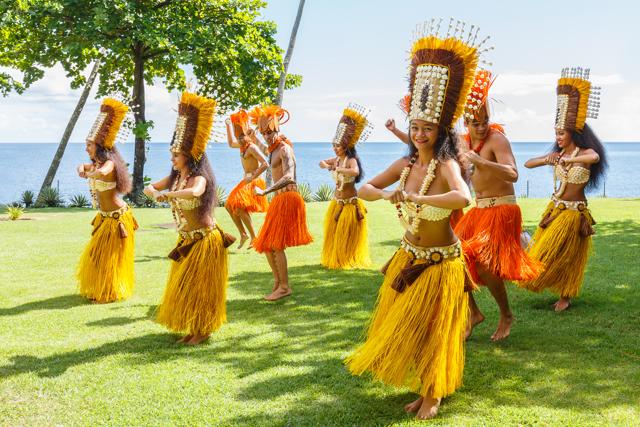 Polynesian women perform a traditional dance in Tahiti , French Polynesia. (Sarayuth3390/Shutterstock) Polynesian women perform a traditional dance in Tahiti , French Polynesia. (Sarayuth3390/Shutterstock)