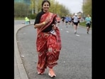 The image shows Madhusmita Jena-Das participating in Manchester Marathon 2023 in a saree. The image shows Madhusmita Jena-Das participating in Manchester Marathon 2023 in a saree.