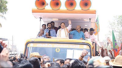 Chief minister Basavaraj Bommai, along with the BJP chief JP Nadda and Kannada film star Kichcha Sudeep, held a massive roadshow while he was on his way to file his nomination papers in Shiggaon. (HT Photo) Chief minister Basavaraj Bommai, along with the BJP chief JP Nadda and Kannada film star Kichcha Sudeep, held a massive roadshow while he was on his way to file his nomination papers in Shiggaon. (HT Photo)