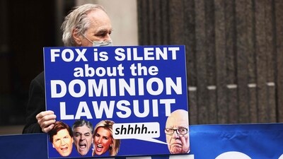 (FILES) In this file photo taken on February 21, 2023 a member of Rise and Resist participates in their weekly "Truth Tuesday" protest at News Corp headquarters in New York City. - A closely-watched civil trial that pits vote machine maker Dominion against Fox News and tests the extent of free speech rights for media in America -- even when broadcasting alleged election falsehoods -- is due to start Thursday, April 13, 2023 with jury selection.
The proceedings could be one of the most consequential defamation cases ever heard in the United States and threaten financial and reputational damage for Rupert Murdoch's conservative TV network. (Photo by Michael M. SANTIAGO / GETTY IMAGES NORTH AMERICA / AFP) (AFP) (FILES) In this file photo taken on February 21, 2023 a member of Rise and Resist participates in their weekly "Truth Tuesday" protest at News Corp headquarters in New York City. - A closely-watched civil trial that pits vote machine maker Dominion against Fox News and tests the extent of free speech rights for media in America -- even when broadcasting alleged election falsehoods -- is due to start Thursday, April 13, 2023 with jury selection.
The proceedings could be one of the most consequential defamation cases ever heard in the United States and threaten financial and reputational damage for Rupert Murdoch's conservative TV network. (Photo by Michael M. SANTIAGO / GETTY IMAGES NORTH AMERICA / AFP) (AFP)