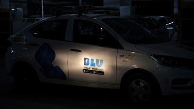 An Indian ride-hailing BluSmart Electric Mobility car is seen at its office in Gurugram. (REUTERS)