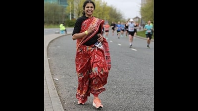 The image shows Madhusmita Jena-Das participating in Manchester Marathon 2023 in a saree. (Twitter/@FISI_UK) The image shows Madhusmita Jena-Das participating in Manchester Marathon 2023 in a saree. (Twitter/@FISI_UK)