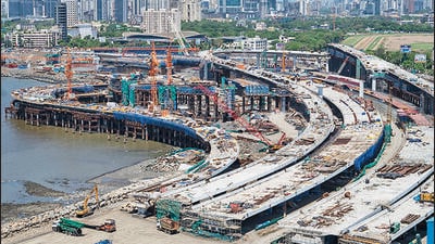 Mumbai, India - April 02, 2023: Aerial view of the Coastal Road project work in progress near the Haji Ali, in Mumbai, India, on Sunday, April 02, 2023. (Photo by Satish Bate/ Hindustan Times) (Satish Bate/HT PHOTO) Mumbai, India - April 02, 2023: Aerial view of the Coastal Road project work in progress near the Haji Ali, in Mumbai, India, on Sunday, April 02, 2023. (Photo by Satish Bate/ Hindustan Times) (Satish Bate/HT PHOTO)