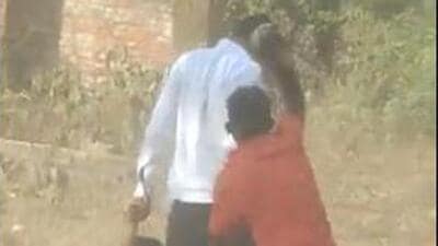 Officials of the Bihar’s Mining Department, including two women, were beaten with sticks allegedly by sand mining mafia after they seized overloaded sand trucks on Monday. (Video grab/ANI) Officials of the Bihar’s Mining Department, including two women, were beaten with sticks allegedly by sand mining mafia after they seized overloaded sand trucks on Monday. (Video grab/ANI)
