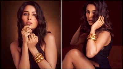 Shehnaaz's black dress features a halter neckline with twisted detail and a crochet-style cropped bralette underneath. A midriff-baring waist cut-out, risque thigh-high slit, a figure-hugging silhouette, and gathered elements added a sultry vibe to the ensemble. (Instagram) Shehnaaz's black dress features a halter neckline with twisted detail and a crochet-style cropped bralette underneath. A midriff-baring waist cut-out, risque thigh-high slit, a figure-hugging silhouette, and gathered elements added a sultry vibe to the ensemble. (Instagram)