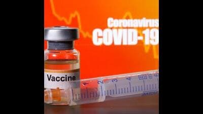 Small bottles labeled with "Vaccine" stickers stand near a medical syringe in front of displayed "Coronavirus COVID-19" words in this illustration taken April 10, 2020. REUTERS/Dado Ruvic/Illustration (REUTERS) Small bottles labeled with "Vaccine" stickers stand near a medical syringe in front of displayed "Coronavirus COVID-19" words in this illustration taken April 10, 2020. REUTERS/Dado Ruvic/Illustration (REUTERS)