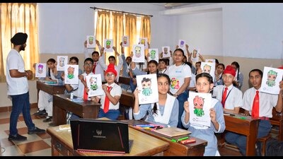 Students showing their painting during the “world largest lesson” organized at BCM school, Basant Avenue branch in Ludhiana on Wednesday. (Manish/HT) Students showing their painting during the “world largest lesson” organized at BCM school, Basant Avenue branch in Ludhiana on Wednesday. (Manish/HT)