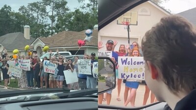 The image, taken from the viral video, shows a woman getting a grand welcome from her neighbours after beating cancer. (Instagram/@majicallynews)