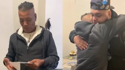 The image, taken from the viral video, shows a father’s reaction after his son surprises him with flight tickets for his home country. (Instagram/@goodnews_movement) The image, taken from the viral video, shows a father’s reaction after his son surprises him with flight tickets for his home country. (Instagram/@goodnews_movement)