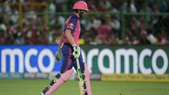 Rajasthan Royals' Jos Buttler walks back to the pavilion during the IPL match against Lucknow Super Giants(AFP)