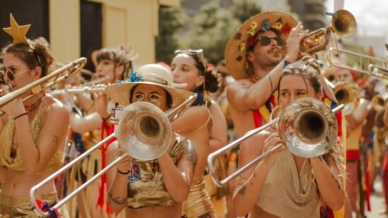 DIY Musical Instruments: Encourage your kids to be creative while making musical instruments. You can make a guitar out of a box, rubber bands, and a stick, or create a drum out of pots and pans. This activity will provide endless hours of entertainment while stimulating your child's imagination.(Pexels)