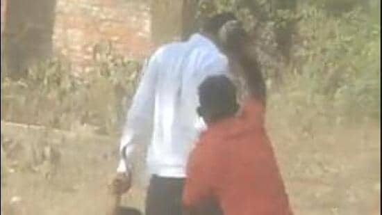 Officials of the Bihar’s Mining Department, including two women, were beaten with sticks allegedly by sand mining mafia after they seized overloaded sand trucks on Monday. (Video grab/ANI)