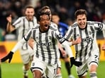 FILE PHOTO: Soccer Football - Coppa Italia - Semi Final - First Leg - Juventus v Inter Milan - Allianz Stadium, Turin, Italy - April 4, 2023  Juventus' Juan Cuadrado celebrates scoring their first goal with Federico Chiesa REUTERS/Massimo Pinca/File Photo