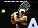 Tennis - WTA 500 - Stuttgart Open - Porsche Arena, Stuttgart, Germany - April 20, 2023 Poland's Iga Swiatek in action during her round of 16 match against China's Qinwen Zheng REUTERS/Angelika Warmuth