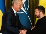 NATO head Jens Stoltenberg (L) shakes hands with Ukrainian President Volodymyr Zelensky at the end of a joint press conference in Kyiv, on April 20, 2023, amid the Russian invasion of Ukraine. 