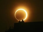 During the hybrid solar eclipse, people witness the sun forming a ring shape -‘ring of fire’- for a few seconds around the moon. 