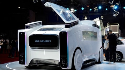A Didi Neuron robotaxi concept is displayed at the Auto Shanghai show, in Shanghai. (REUTERS)