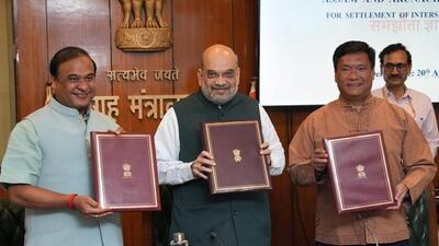 Amit Shah with Assam CM and Arunachal Pradesh CM during signing of the boundary agreement. (PTI photo) Amit Shah with Assam CM and Arunachal Pradesh CM during signing of the boundary agreement. (PTI photo)