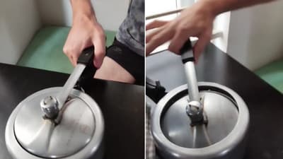 The image, taken from the Twitter video, shows the Canadian blogger living in India opening a pressure cooker with one hand. (Twitter/@caleb_friesen2) The image, taken from the Twitter video, shows the Canadian blogger living in India opening a pressure cooker with one hand. (Twitter/@caleb_friesen2)