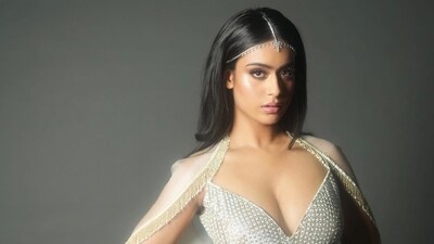 Nysa Devgan wore a shimmery silver dress for the Nita Mukesh Ambani Cultural Centre event. Her photos were shared by Kajol. Nysa Devgan wore a shimmery silver dress for the Nita Mukesh Ambani Cultural Centre event. Her photos were shared by Kajol. 