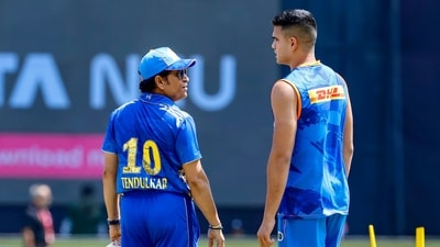 Sachin Tendulkar (L) with son Arjun (PTI)