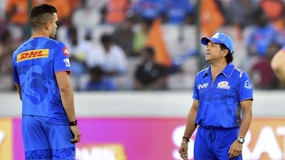Sachin Tendulkar of Mumbai Indians interacts with his son Arjun Tendulkar. (PTI) Sachin Tendulkar of Mumbai Indians interacts with his son Arjun Tendulkar. (PTI)
