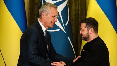 NATO head Jens Stoltenberg (L) shakes hands with Ukrainian President Volodymyr Zelensky at the end of a joint press conference in Kyiv, on April 20, 2023, amid the Russian invasion of Ukraine. (AFP)